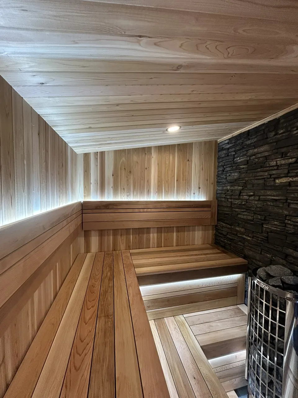 Backyard sauna: interior lighting and wood lining