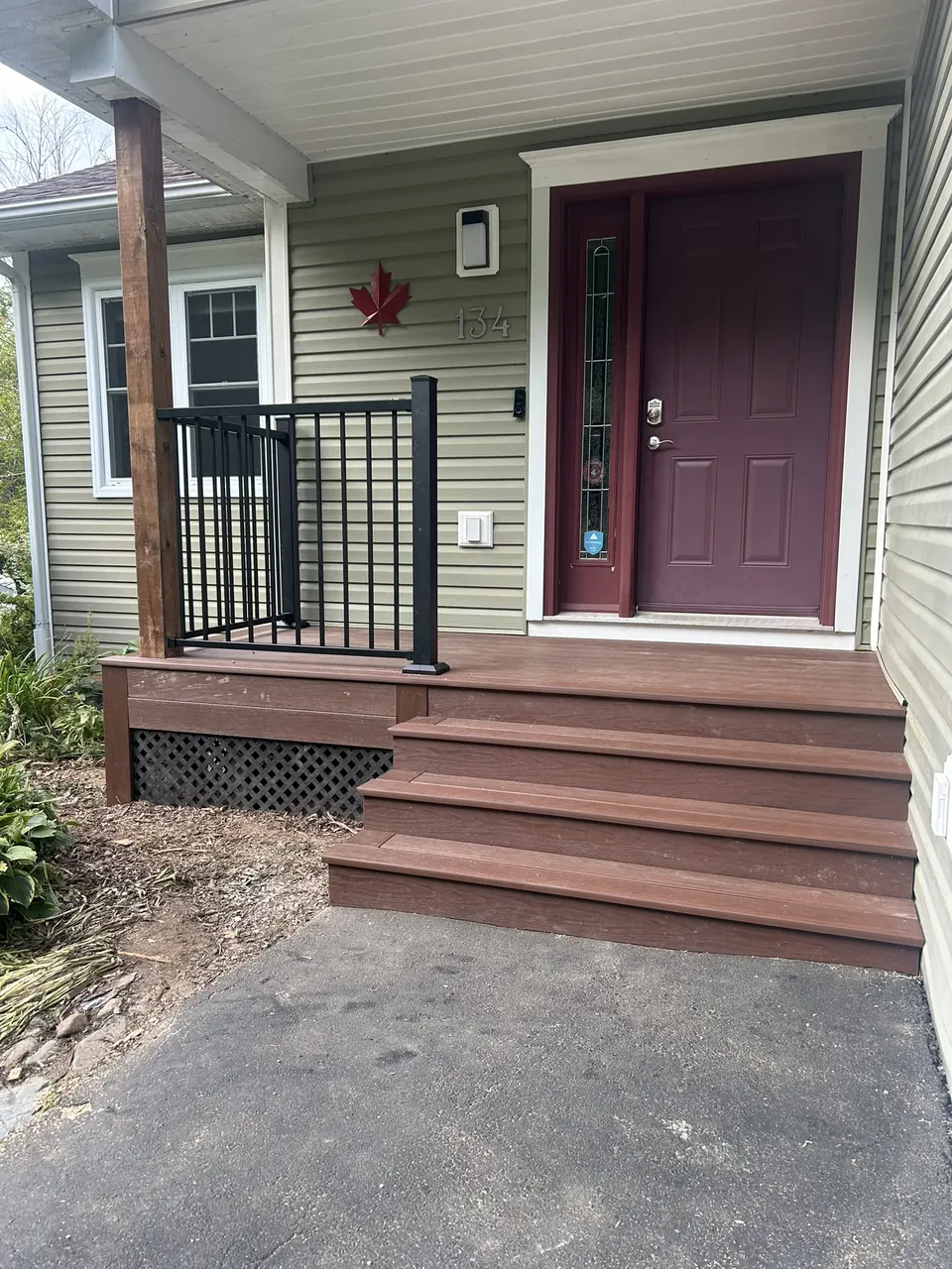 Burgundy-door entry: front entry and wide steps