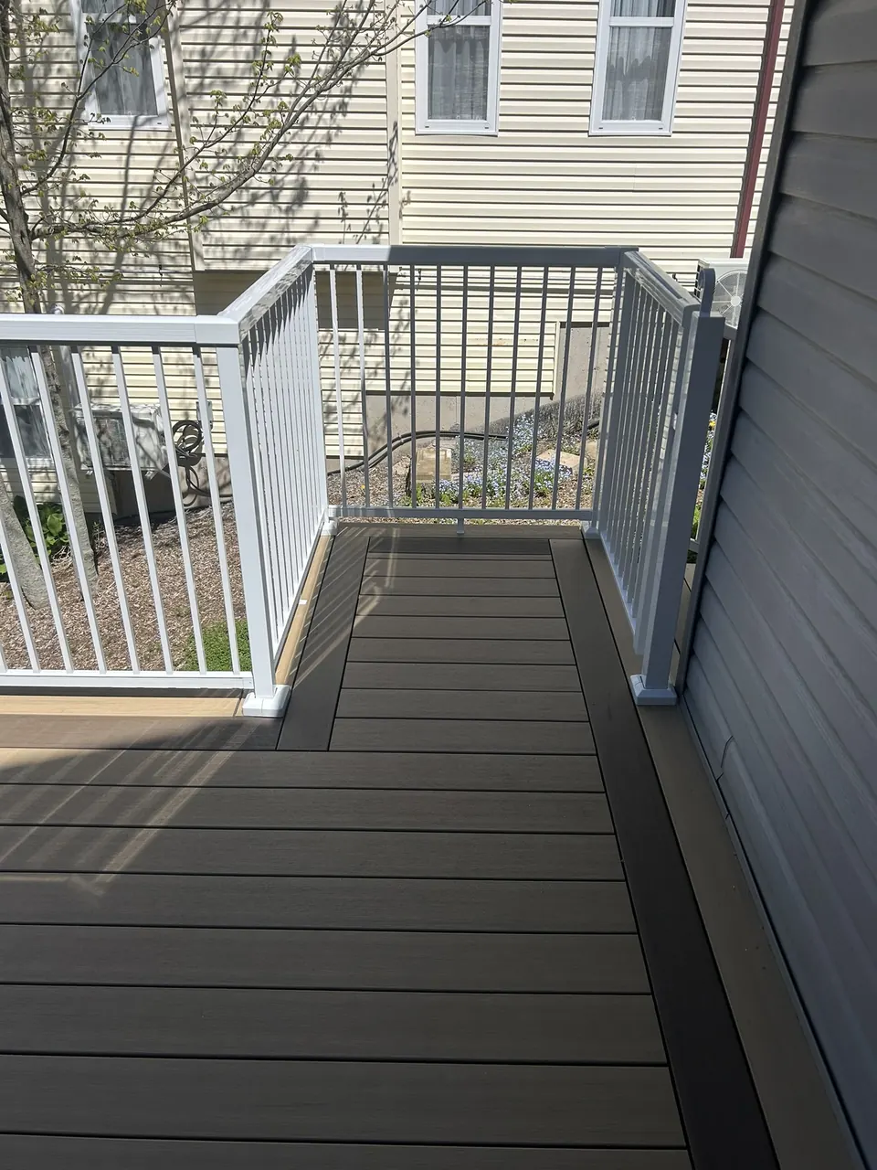 Rear deck & white rails: stairs from above
