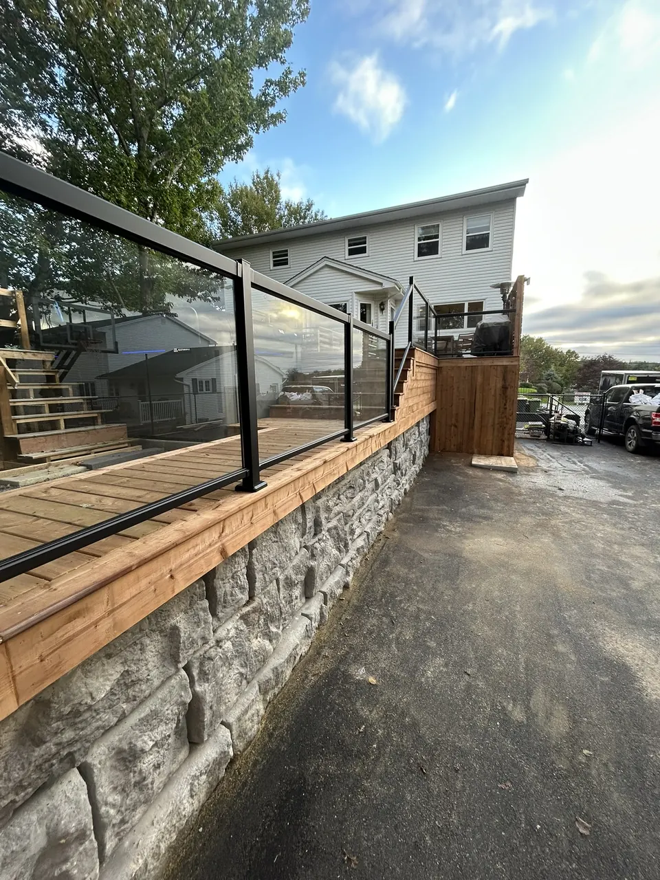 Terraced deck & glass rails: deck edge and glass railing