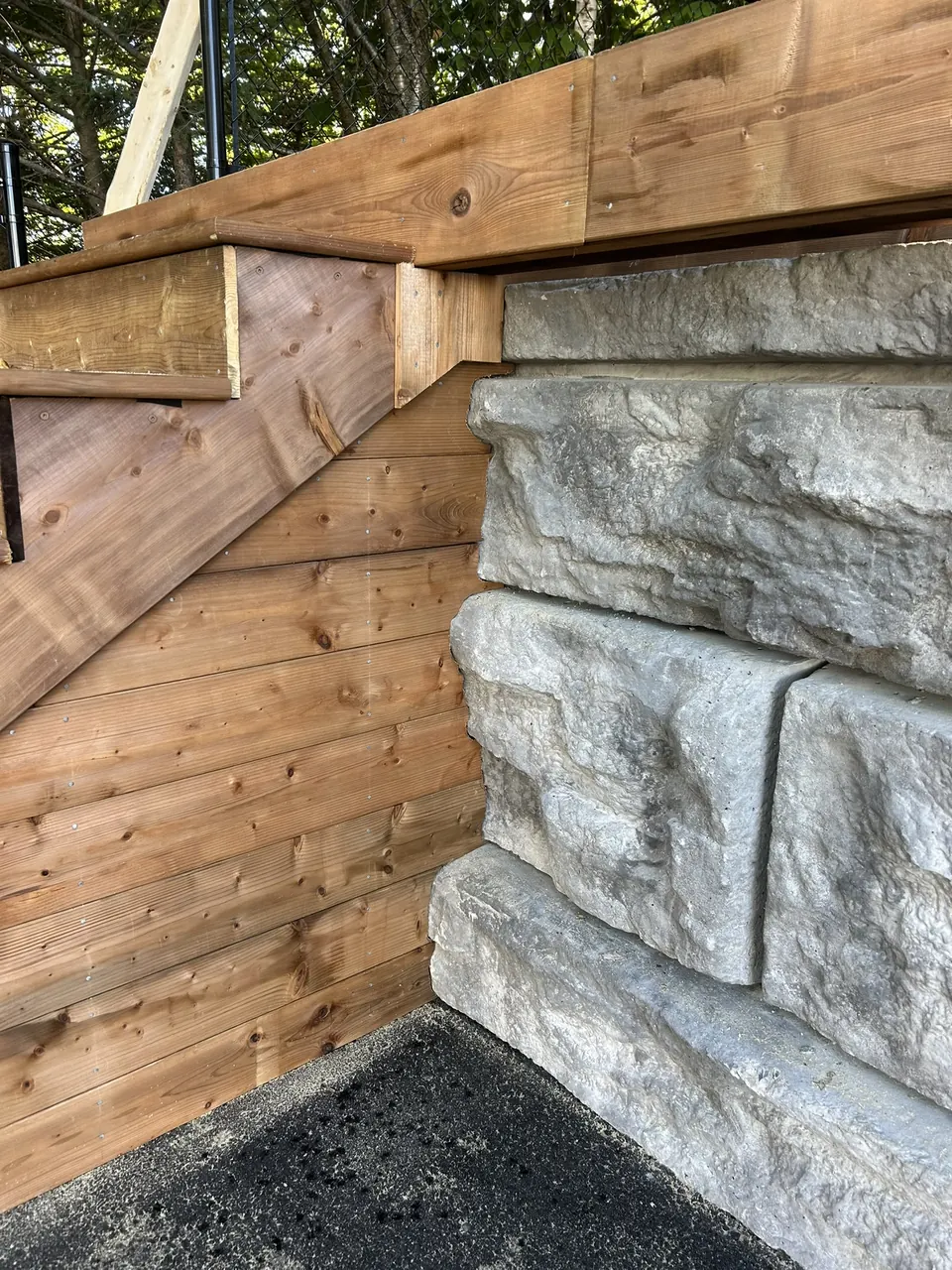 Terraced deck & glass rails: wood and stone junction