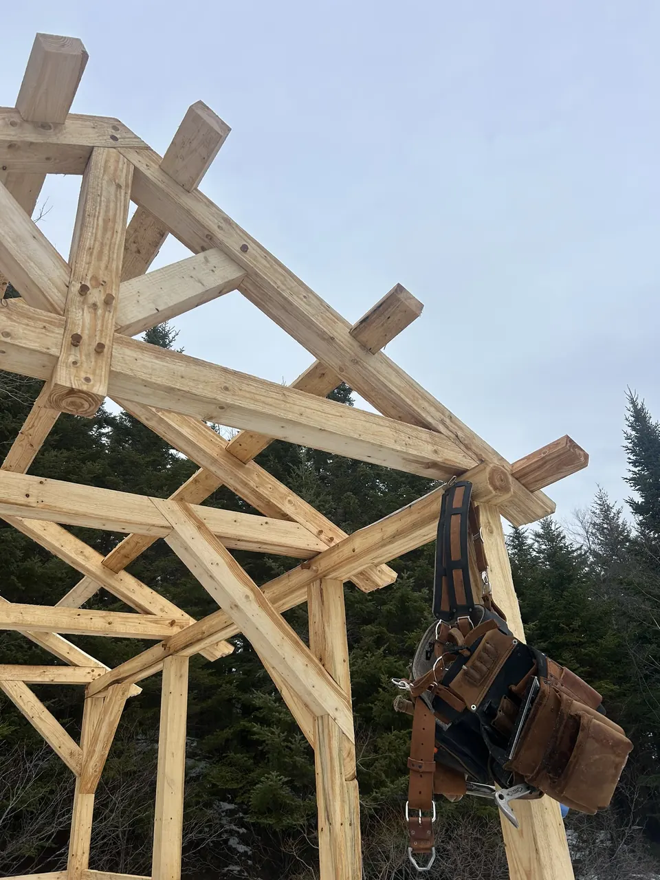 Timber-frame details: exposed frame and pegged connections