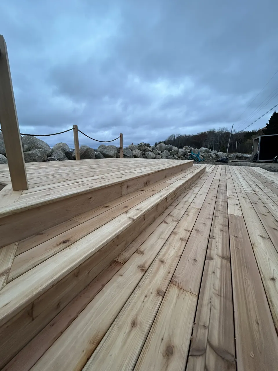 Waterfront wood platform: deck boards and low steps