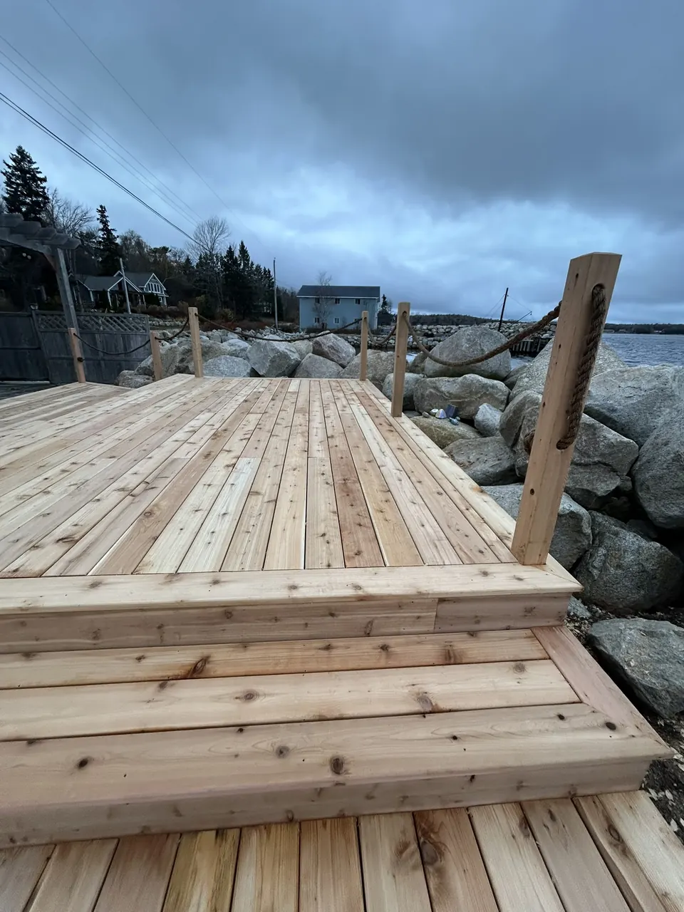 Waterfront wood platform: platform and steps along the shoreline