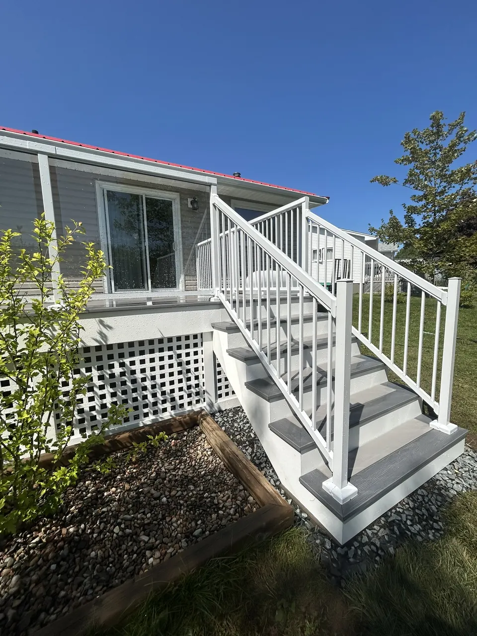 White-railed deck: stair and railing detail